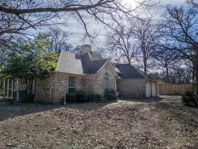 Discover your dream lifestyle in this splendid 3 bedroom, 2 bath on Holly Lake Ranch Golf Club in Texas - for sale on GolfHomes.com, golf home, golf lot