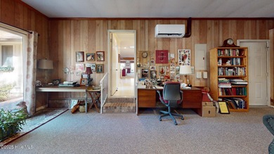 Welcome to this charming and spacious one-story home situated on on Whispering Pines Golf Course in North Carolina - for sale on GolfHomes.com, golf home, golf lot