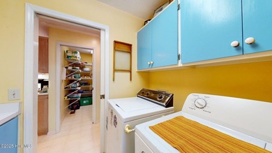 Welcome to this charming and spacious one-story home situated on on Whispering Pines Golf Course in North Carolina - for sale on GolfHomes.com, golf home, golf lot