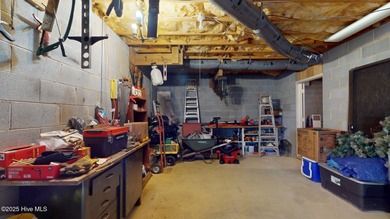 Welcome to this charming and spacious one-story home situated on on Whispering Pines Golf Course in North Carolina - for sale on GolfHomes.com, golf home, golf lot