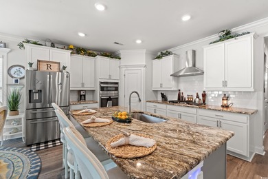 Live like you're on vacation every day in this impressive on Surf Golf and Beach Club in South Carolina - for sale on GolfHomes.com, golf home, golf lot