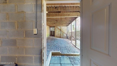 Welcome to this charming and spacious one-story home situated on on Whispering Pines Golf Course in North Carolina - for sale on GolfHomes.com, golf home, golf lot