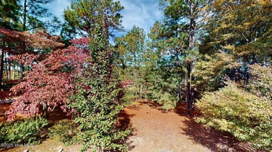 Welcome to this charming and spacious one-story home situated on on Whispering Pines Golf Course in North Carolina - for sale on GolfHomes.com, golf home, golf lot