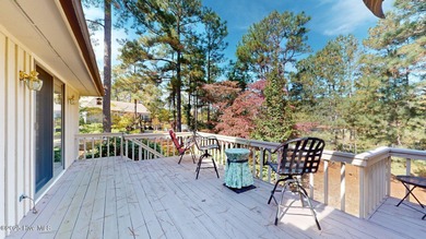Welcome to this charming and spacious one-story home situated on on Whispering Pines Golf Course in North Carolina - for sale on GolfHomes.com, golf home, golf lot