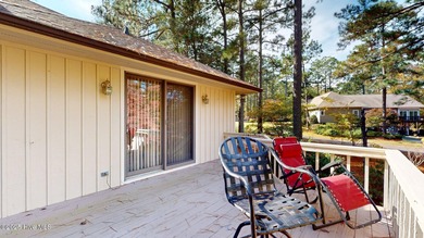 Welcome to this charming and spacious one-story home situated on on Whispering Pines Golf Course in North Carolina - for sale on GolfHomes.com, golf home, golf lot