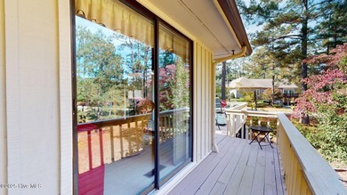 Welcome to this charming and spacious one-story home situated on on Whispering Pines Golf Course in North Carolina - for sale on GolfHomes.com, golf home, golf lot