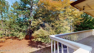 Welcome to this charming and spacious one-story home situated on on Whispering Pines Golf Course in North Carolina - for sale on GolfHomes.com, golf home, golf lot