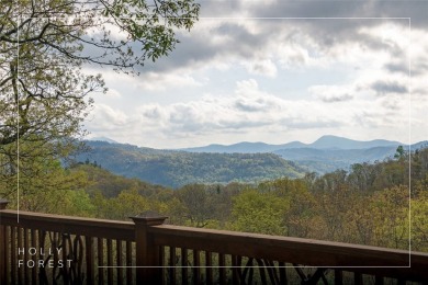 Experience breathtaking long-range mountain views and a serene on Sapphire National Golf Club in North Carolina - for sale on GolfHomes.com, golf home, golf lot