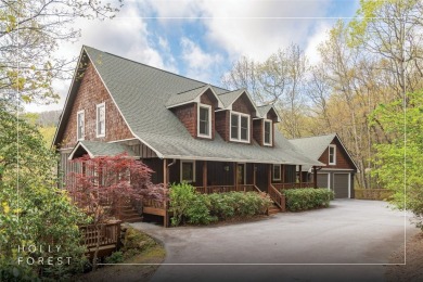 Experience breathtaking long-range mountain views and a serene on Sapphire National Golf Club in North Carolina - for sale on GolfHomes.com, golf home, golf lot