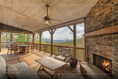 Experience breathtaking long-range mountain views and a serene on Sapphire National Golf Club in North Carolina - for sale on GolfHomes.com, golf home, golf lot