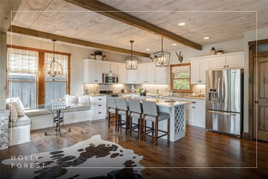 Experience breathtaking long-range mountain views and a serene on Sapphire National Golf Club in North Carolina - for sale on GolfHomes.com, golf home, golf lot