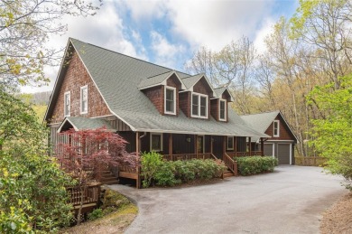 Experience breathtaking long-range mountain views and a serene on Sapphire National Golf Club in North Carolina - for sale on GolfHomes.com, golf home, golf lot
