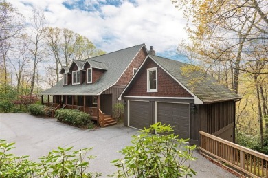Experience breathtaking long-range mountain views and a serene on Sapphire National Golf Club in North Carolina - for sale on GolfHomes.com, golf home, golf lot