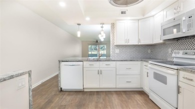 Renovated 1st Floor Condo with Water & Golf Course Views in on Wynmoor Golf Course in Florida - for sale on GolfHomes.com, golf home, golf lot