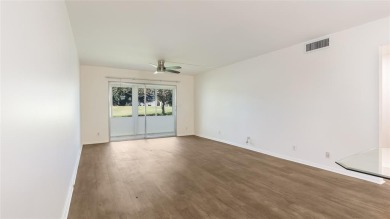 Renovated 1st Floor Condo with Water & Golf Course Views in on Wynmoor Golf Course in Florida - for sale on GolfHomes.com, golf home, golf lot