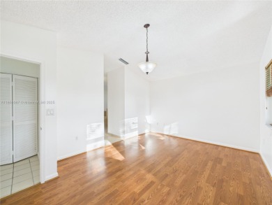 This charming & meticulously maintained home sits on a lush on Grand Palms Hotel and Golf Resort in Florida - for sale on GolfHomes.com, golf home, golf lot