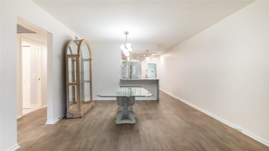 Renovated 1st Floor Condo with Water & Golf Course Views in on Wynmoor Golf Course in Florida - for sale on GolfHomes.com, golf home, golf lot