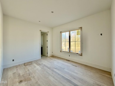 Located in a prime setting within North Raleigh's premier on North Ridge Country Club in North Carolina - for sale on GolfHomes.com, golf home, golf lot