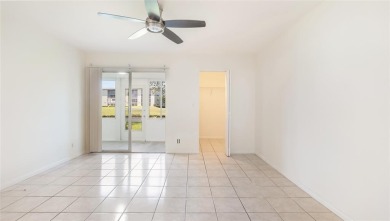 Renovated 1st Floor Condo with Water & Golf Course Views in on Wynmoor Golf Course in Florida - for sale on GolfHomes.com, golf home, golf lot