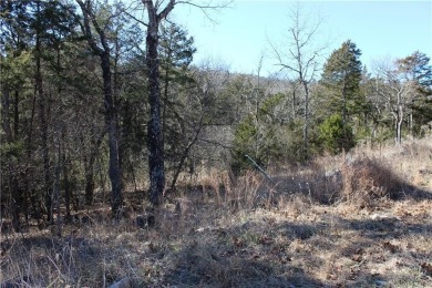 This exceptional, mostly cleared lot offers a level area perfect on Holiday Island Golf Course in Arkansas - for sale on GolfHomes.com, golf home, golf lot