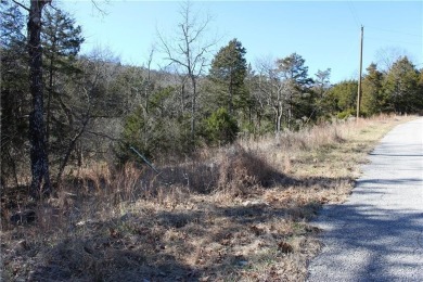 This exceptional, mostly cleared lot offers a level area perfect on Holiday Island Golf Course in Arkansas - for sale on GolfHomes.com, golf home, golf lot
