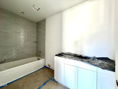 Located in a prime setting within North Raleigh's premier on North Ridge Country Club in North Carolina - for sale on GolfHomes.com, golf home, golf lot