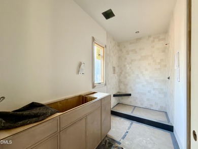 Located in a prime setting within North Raleigh's premier on North Ridge Country Club in North Carolina - for sale on GolfHomes.com, golf home, golf lot