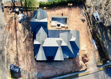 Located in a prime setting within North Raleigh's premier on North Ridge Country Club in North Carolina - for sale on GolfHomes.com, golf home, golf lot