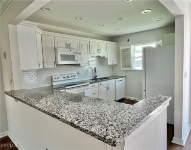 *BEAUTIFUL POOLSIDE LOCATION*OPEN RENOVATED KITCHEN*NEW on Myerlee Country Club in Florida - for sale on GolfHomes.com, golf home, golf lot