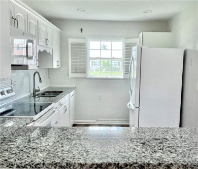 *BEAUTIFUL POOLSIDE LOCATION*OPEN RENOVATED KITCHEN*NEW on Myerlee Country Club in Florida - for sale on GolfHomes.com, golf home, golf lot