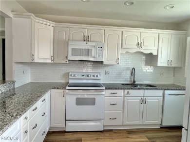 *BEAUTIFUL POOLSIDE LOCATION*OPEN RENOVATED KITCHEN*NEW on Myerlee Country Club in Florida - for sale on GolfHomes.com, golf home, golf lot
