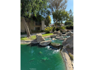 Beautiful Valencia Lakeshore condo, on the lower level, with one on Vista Valencia Golf Course in California - for sale on GolfHomes.com, golf home, golf lot