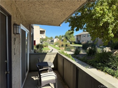 Beautiful Valencia Lakeshore condo, on the lower level, with one on Vista Valencia Golf Course in California - for sale on GolfHomes.com, golf home, golf lot