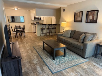 Beautiful Valencia Lakeshore condo, on the lower level, with one on Vista Valencia Golf Course in California - for sale on GolfHomes.com, golf home, golf lot