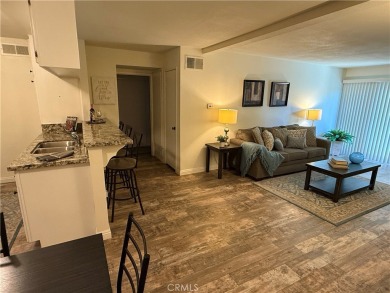 Beautiful Valencia Lakeshore condo, on the lower level, with one on Vista Valencia Golf Course in California - for sale on GolfHomes.com, golf home, golf lot