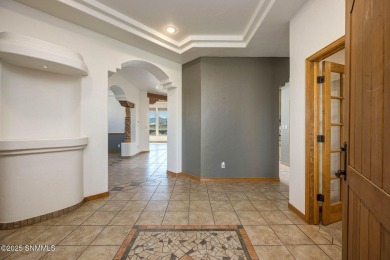 Backing onto the 7th fairway with breathtaking Organ Mountain on Sonoma Ranch Golf Course in New Mexico - for sale on GolfHomes.com, golf home, golf lot