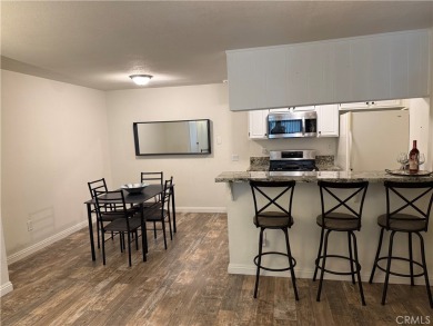 Beautiful Valencia Lakeshore condo, on the lower level, with one on Vista Valencia Golf Course in California - for sale on GolfHomes.com, golf home, golf lot