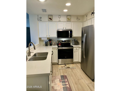 STUNNING REMODEL. BRAND NEW ROOF AND HOT WATER HEATER IN 2023 on Trail Ridge Golf Course in Arizona - for sale on GolfHomes.com, golf home, golf lot