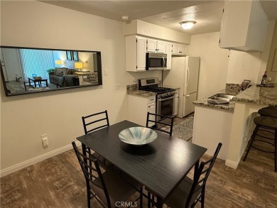 Beautiful Valencia Lakeshore condo, on the lower level, with one on Vista Valencia Golf Course in California - for sale on GolfHomes.com, golf home, golf lot