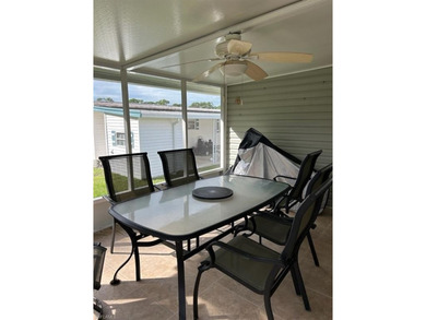 This 2008 Jacobson manufactured home is located on one of the on Pelicans Nest Golf Club in Florida - for sale on GolfHomes.com, golf home, golf lot