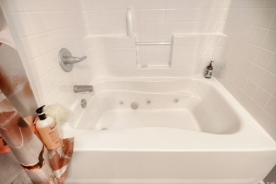 Turnkey Furnished Top-Floor End Unit with Golf Course  Waterway on Arrowhead Country Club in South Carolina - for sale on GolfHomes.com, golf home, golf lot