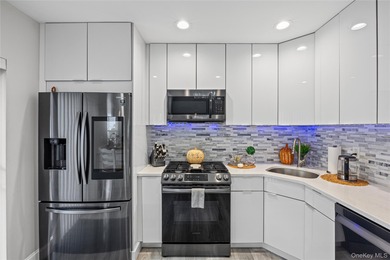 This tastefully remodeled townhome was designed with style and on Birchwood at Spring Lake in New York - for sale on GolfHomes.com, golf home, golf lot