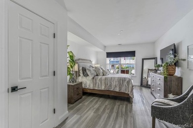 This tastefully remodeled townhome was designed with style and on Birchwood at Spring Lake in New York - for sale on GolfHomes.com, golf home, golf lot