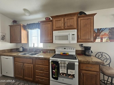 On The Greens! This stunning 1-bedroom plus Queen Size Murphy on Viewpoint Golf Resort in Arizona - for sale on GolfHomes.com, golf home, golf lot