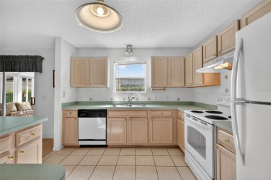 Wonderful TURNKEY 2/2 Catalina with ENCLOSED LANAI and PRIVACY on El Diablo Executive Golf Course in Florida - for sale on GolfHomes.com, golf home, golf lot