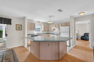 Wonderful TURNKEY 2/2 Catalina with ENCLOSED LANAI and PRIVACY on El Diablo Executive Golf Course in Florida - for sale on GolfHomes.com, golf home, golf lot