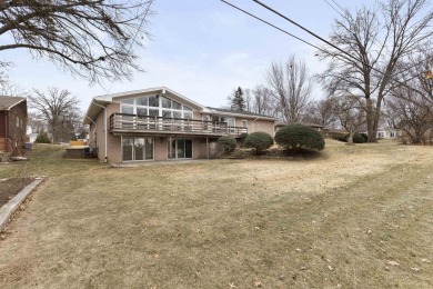 Awesome mid-century ranch w/full walk-out lower level. Overlooks on Mauh-Nah-Tee-See Country Club in Illinois - for sale on GolfHomes.com, golf home, golf lot