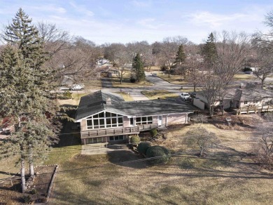 Awesome mid-century ranch w/full walk-out lower level. Overlooks on Mauh-Nah-Tee-See Country Club in Illinois - for sale on GolfHomes.com, golf home, golf lot