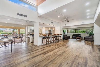 Step into one of Cove Cay's most coveted finds--an oversized on Cove Cay Country Club in Florida - for sale on GolfHomes.com, golf home, golf lot
