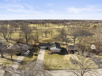 Awesome mid-century ranch w/full walk-out lower level. Overlooks on Mauh-Nah-Tee-See Country Club in Illinois - for sale on GolfHomes.com, golf home, golf lot